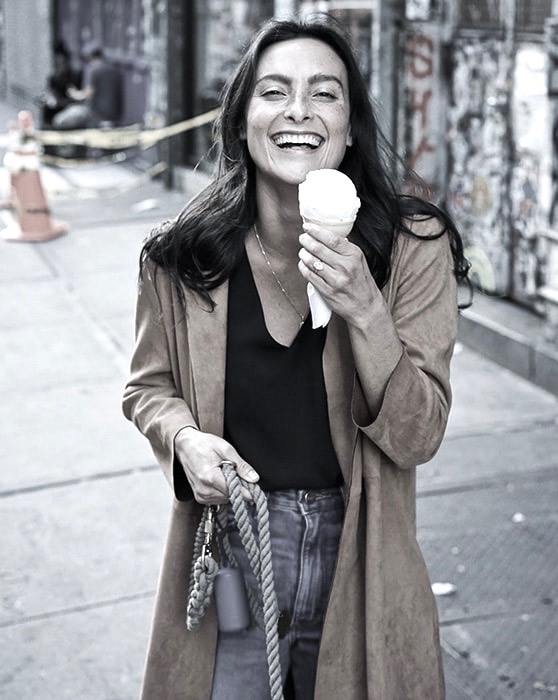 Happy woman eating ice cream - Food Confidence